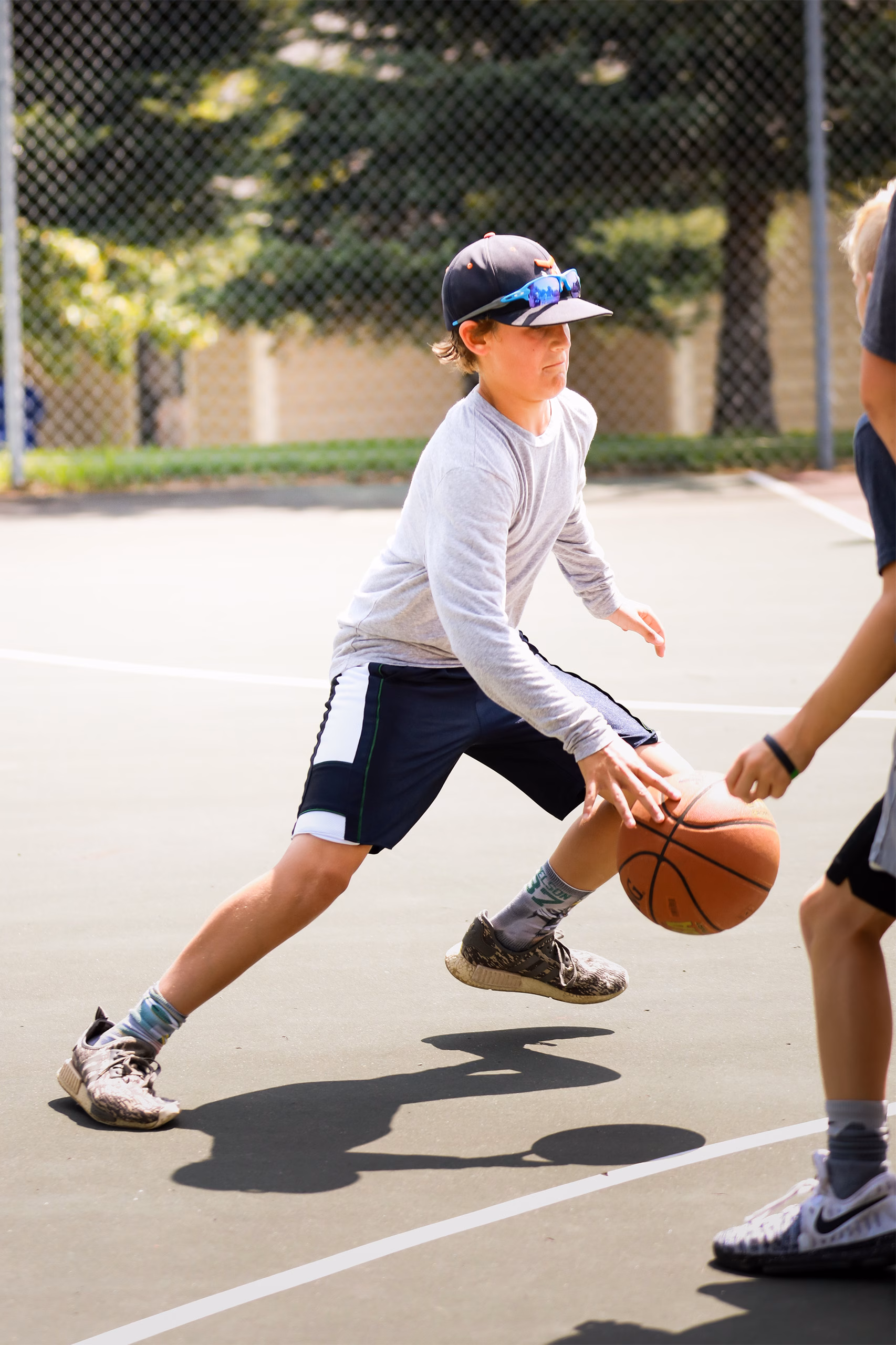 Boy Playing Basketball At Kavanaughs